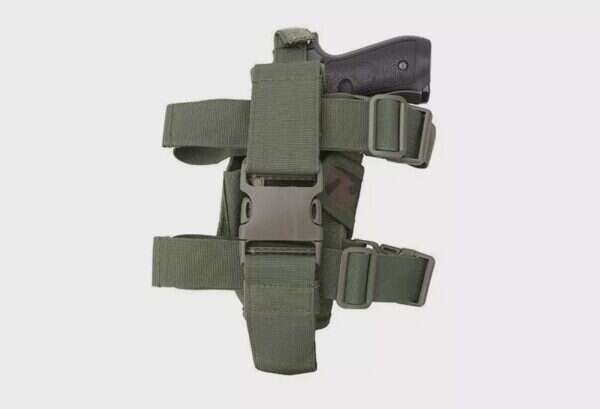 Thigh holster with magazine pouch