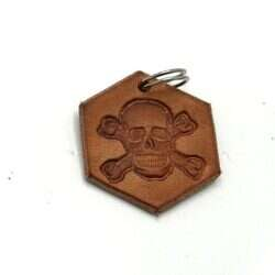 Handmade pendant with scull and bone made of swedish leather