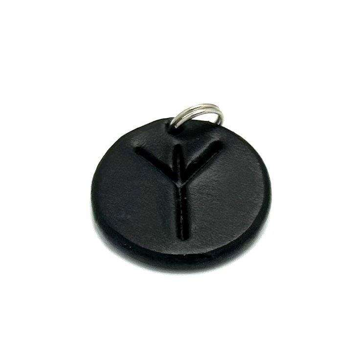 Handmade pendant with nordic rune made of swedish leather